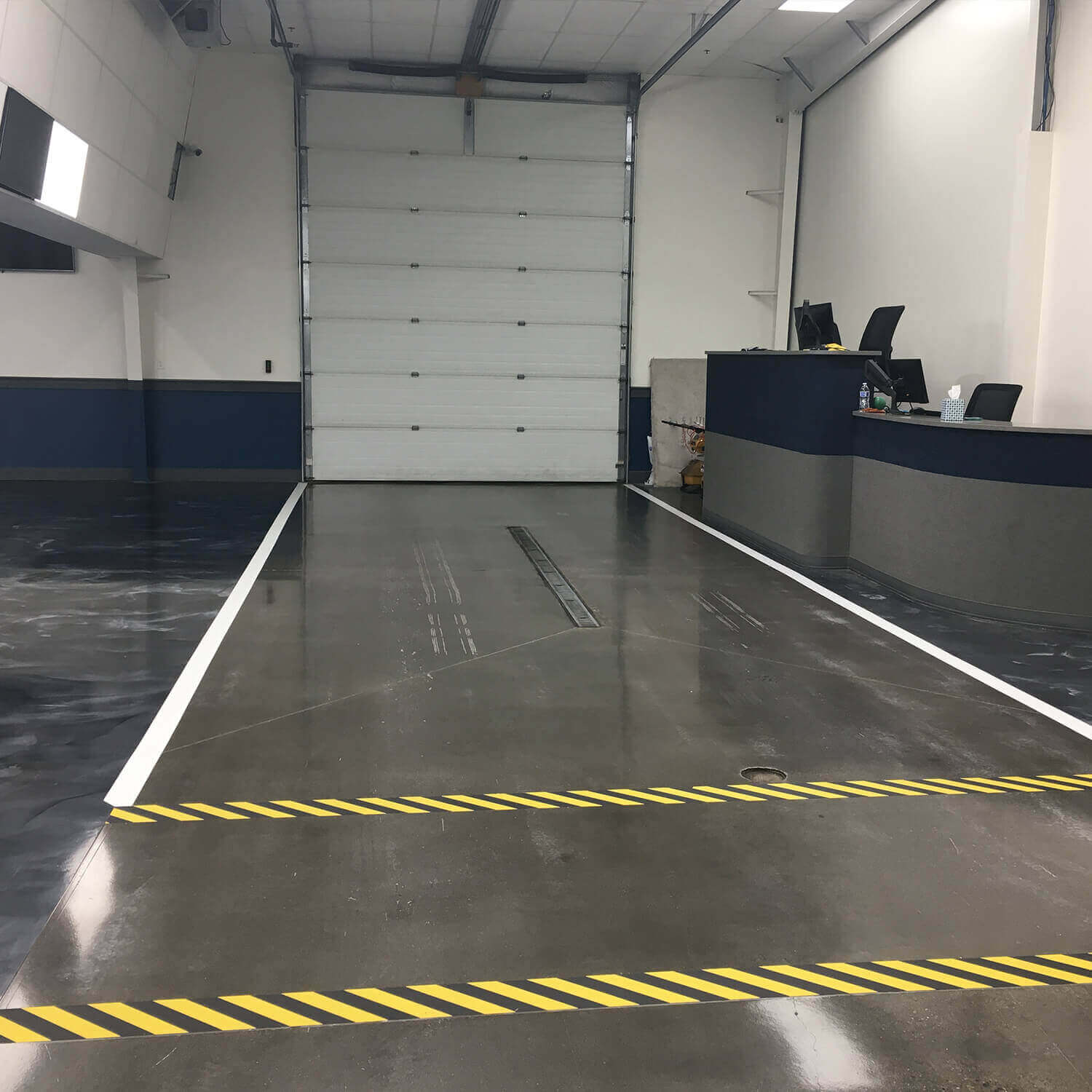 White Lines and Yellow and Black Guides in Garage Web